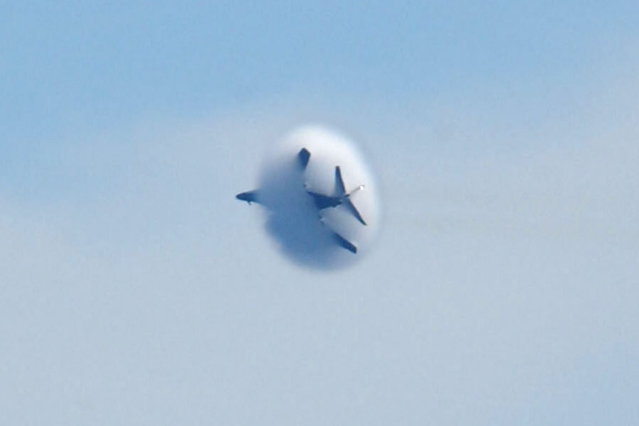 2. A B-1B Lancer Bomber Banks Left, United States Air Force. January 16, 2004, Southwest Asia. Flying at transonic speeds -- speeds varying near and at the speed of sound (supersonic) -- can generate impressive condensation clouds caused by the Prandtl-Glauert Singularity. For a scientific explanation, see Professor M. S. Cramer's Gallery of Fluid Mechanics, Prandtl-Glauert Singularity at <http://www.GalleryOfFluidMechanics.com/conden/pg_sing.htm>; and Foundations of Fluid Mechanics, Navier-Stokes Equations Potential Flows: Prandtl-Glauert Similarity Laws at <http://www.Navier-Stokes.net/nspfsim.htm>. Photo Credit: Staff Sgt. Shelley Gill, Still Photography Journeyman, 125th Fighter Wing, Florida Air National Guard, USA; Air Force Link - Photos (http://www.af.mil/photos, 040116-F-0971G-156, Breaking the barrier), United States Air Force (USAF, http://www.af.mil), United States Department of Defense (DoD, http://www.DefenseLink.mil or http://www.dod.gov), Government of the United States of America (USA). Additional information: The USAF B1-B Lancer photos leading to this one are in the ChamorroBible.org 3rd Collection of Prandtl-Glauert Condensation Clouds, a photo sequence presented on Umayanggan (Disiembre) 16, 2004. On the same day, January 16th, 2004, Staff Sgt. Shelley R. Gill photographed the same B1-B aircraft with a different Prandtl-Glauert condensation cloud. These photos are in the ChamorroBible.org 4th Collection of Prandtl-Glauert Condensation Clouds published on Umayanggan (Disiembre) 17, 2004.